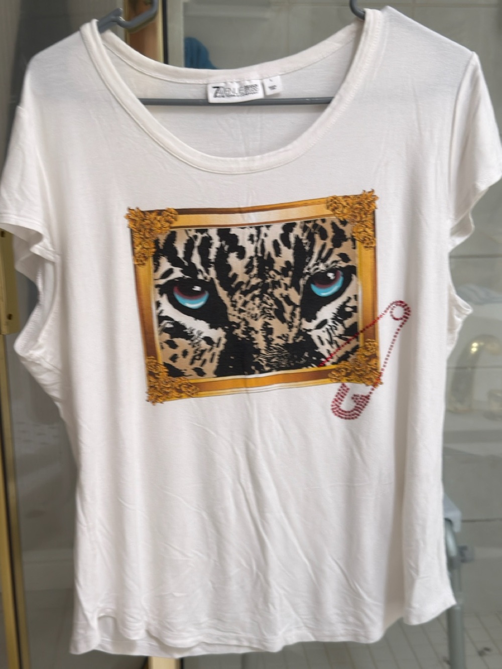 Women’s white flowy shirt. Leopard Print face. Custom clothespin decor. Drape 😍